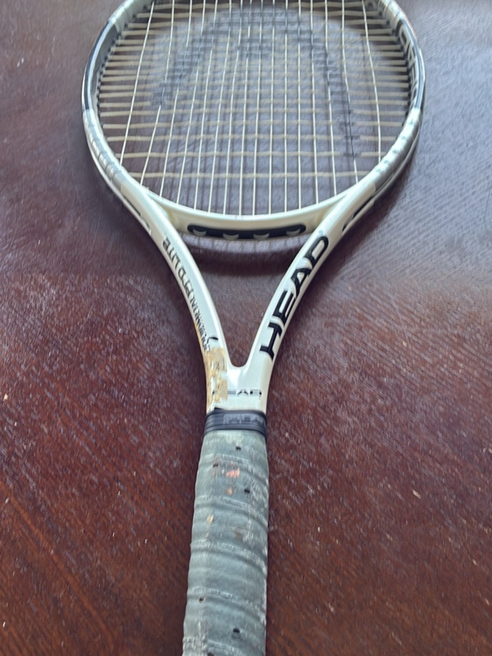 HEAD Silver Tennis Racket with Black Logo